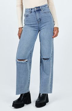 Made partially with organic cotton, these classic-fit straight-leg jeans feature ripped knees and raw hems for casual-cool, vintage-inspired style. 29 1/2" inseam; 20" leg opening; 13" front rise; 15 1/2" back rise (size 8) Zip fly with button closure Five-pocket style 50% organic cotton, 50% recycled cotton Machine wash, line dry Imported Trendy Straight Distressed Jeans, Trendy Distressed Straight Bottoms, Ripped Straight Jeans For Spring, Trendy Distressed Straight Jeans, Trendy Straight Distressed Bottoms, Casual Ripped Cropped Jeans In Rigid Denim, Distressed Straight Leg Cropped Jeans, Casual Cropped Ripped Straight Leg Jeans, Casual Ripped Straight Leg Cropped Jeans