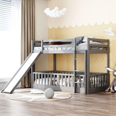 a child's bedroom with bunk beds and a slide