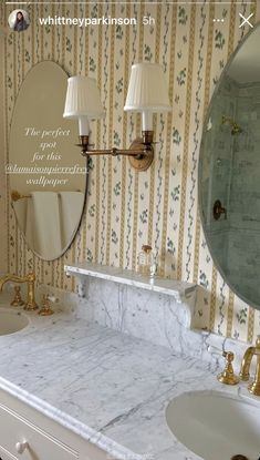 a bathroom with two sinks and a large mirror on the wall next to each other