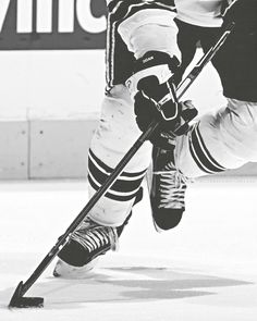 a hockey player is skating on the ice