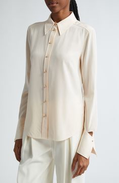 Split cuffs bring a bit of innovative tailoring to this polished button-up shirt fashioned from fluid silk crêpe de Chine. Front button closure Point collar Long sleeves with one-button cuffs 100% silk Dry clean Imported Designer Clothing Silk Crepe, Soft Pink, Top Brands, Button Up Shirts, Button Up, Shirt Style, Nordstrom, Cuff, Collar