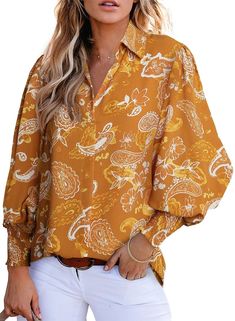 PRICES MAY VARY. V-Neck with Top Button: This 2024 women's balloon sleeves blouse features a V-neck design with a single top button, The only button is at the collar, and the rest of the blouse is stitched closed. The material of the blouse feels silky against the skin. The lantern sleeve detail on this women's shirt adds a fashionable statement.The elastic smocked wrist is comfortable,snug and stretchy for setting a different sleeve length.The sleeves are really nice when you wear them as long Balloon Sleeves Blouse, V Neck Shirts, Oversized Button Down Shirt, Lantern Sleeved Blouses, Paisley Top, Shirts Long Sleeve, Trendy Blouses, Women Blouse, Blouse Tops