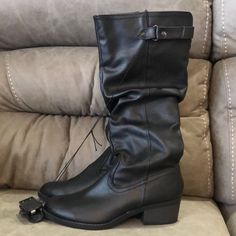 Womens Slip On Black Boots Size 6.5 From Bottom Heel To Top They Measure 16” These Classic Boots By Time And Tru Are Sure To Be Your Go-To For The Fall And Winter Months. With A Subtle Faux-Leather Upper These Tall Women’s Boots Can Be Worn With Jeans To Dresses. Fit And Comfort Features Like A Memory Foam Cushioned Insole, Fabric Lining Make These Boots A Great Go-To Black Faux Leather Boots With Low Heel, Black Wide Calf Lace-up Mid-calf Boots, Wide Calf Black Mid-calf Lace-up Boots, Black Lace-up Wide Calf Mid-calf Boots, Black Lace-up Mid-calf Boots For Wide Calf, Black Wide-calf Mid-calf Lace-up Boots, Black Wide Calf Knee-high Boots With Flat Heel, Black Knee-high Boots With Wide Calf And Flat Heel, Black Flat Heel Knee-high Boots With Wide Calf