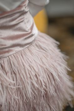 This stylish Dusty Pink Feather Skirt is the perfect item for your little girl's wardrobe. Crafted from a combination of dusty pink velour and plush ostrich feathers, it is sure to make any occasion special. The high-quality materials make this skirt sure to last and will always bring a special touch to any look. 92% Polyester, 8% Spandex, dyed Ostrich Feathers Color is dusty pink Fully lined Imported Fit is true to size, above the knee Care Instructions: Hand wash in cold water and mild deterge Pink Feather Skirt, Knee Care, Feather Skirt, Ostrich Feather, Pink Feathers, Colorful Feathers, Girls Wardrobe, Ostrich Feathers