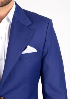 A distinct and striking look, the Ellis Royal Blue Twill suit is custom made for those who want to make a statement. The vibrant color features a subtle hint of purple for a bold look. Exude confidence in royal blue. Classic Royal Blue Single Breasted Blazer, Classic Single Breasted Royal Blue Blazer, Tailored Royal Blue Blazer With Suit Collar, Classic Purple Tuxedo For Semi-formal Events, Fitted Royal Blue Suit For Business, Tailored Blue Three-piece Suit For Formal Occasions, Fitted Royal Blue Business Suit, Classic Royal Blue Blazer With Suit Collar, Royal Blue Notch Lapel Blazer For Tailoring