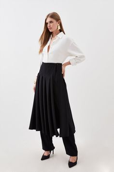 This Fashion-Forward Design Is The Ultimate Versatile Staple Piece. Featuring A Detachable Skirt Detail, These Tailored Crepe Pants Make A Sophisticated Workwear Or Evening Choice. Style With Black Heels For A Sleek Look.Tailored Crepedetachable Skirt Design Skirts Layered Over Pants, Skirt Trousers Outfit, Layer Skirt Outfit, Skirt Pants Outfit, Skirt Over Pants Outfits, Skz Fits, Skirt Over Trousers, Skirts Over Pants, Neutral Tones Fashion