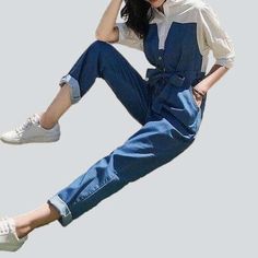 Introducing the 2023 Spring-Summer Collection's must-have for fashion-forward women ââ‚?our fashionable medium wash jeans overall! The perfect blend of contemporary fashion and classic sophistication. this stylish piece is designed to make a statement. no matter the occasion.Why They're Your Next StapleThese jeans overall are crafted to capture an edgy and refined style. with a loose fit that promises comfort and chicness. Their distinctive medium wash is the perfect backdrop for the unique butt Chic Denim Jumpsuits And Rompers For Summer, Denim High-rise Jumpsuits And Rompers With Pockets, High Rise Denim Jumpsuits And Rompers With Pockets, Denim Jumpsuits And Rompers With Pockets And High Rise, Chic Medium Wash Cotton Denim Jumpsuit, Spring Medium Wash Denim Jumpsuits And Rompers, Chic Denim Blue Jumpsuits And Rompers With Pockets, Chic High Waist Cotton Overalls, Chic Medium Wash Overalls For Spring