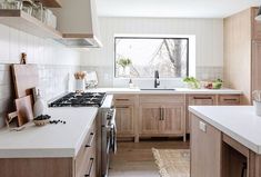 the kitchen is clean and ready for us to use it's new counter tops