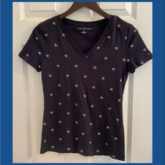 This Is A Brand New With Tags Tommy Hilfiger Allover Star Logo Print T-Shirt. Size Small. V-Neck. Dark Blue. 100% Cotton. Spring Graphic Tee With Star Print, Casual V-neck Star Print Top, Short Sleeve Cotton Top With Star Print, Cotton Short Sleeve Tops With Star Print, Casual Short Sleeve Top With Star Print, Fitted Blue Top With Star Print, Blue Cotton Star Print Tops, Blue Short Sleeve Tops With Star Print, Blue Short Sleeve Top With Star Print