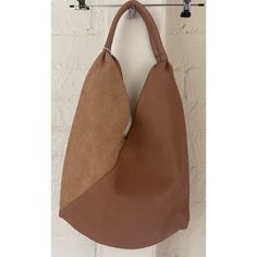 This Women's Tote Bag, Crafted From Pebble Grain Pu And Suede Pu, Is A Testament To The Brand's Focus On Detail And Quality. Ideal For Any Season, This Tote Is Not Just A Bag, It's A Lifestyle Statemen: Tsingle, Shoulder Strap, 1 Interior Zip Pocket, Magnetic Closure, Dust Cloth, Vegan L 18" X W 3" X H 10"; Hnd 11" Brown Bucket Bag With Magnetic Closure, Everyday Brown Hobo Bag With Magnetic Closure, Brown Hobo Bag With Magnetic Closure For Everyday Use, Versatile Hobo Tote Bag With Magnetic Closure, Versatile Hobo Bag With Magnetic Closure For Shopping, Reversible Bucket Bag, Chic Reversible Bags For Daily Use, Chic Reversible Shoulder Bag For Shopping, Brown Bags With Magnetic Closure For Shopping