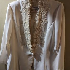 Karen Miller White Formal Style Jacket. Perfect For That Spring Or Summer Wedding Or Shower. Never Worn But Has A Very Small Pick On The Back. I Tried To Take A Picture Of It But It Is So Small It Didn't Show Up Well. Size 16. White Long Sleeve Outerwear For Ceremony, Elegant Party Outerwear With Lace Trim, Spring Wedding Cream Blazer, Formal Long Sleeve Outerwear With Lace Trim, Fitted White Outerwear For Ceremony, White Long Sleeve Outerwear For Weddings, Elegant Fitted Outerwear For Ceremony, Elegant Long Sleeve Outerwear For Ceremony, Elegant Fitted Outerwear For Mother Of The Bride