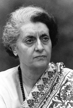 black and white photograph of a woman wearing a scarf