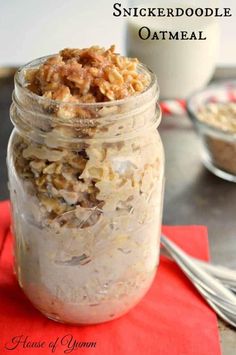 a glass jar filled with oatmeal sitting on top of a red napkin