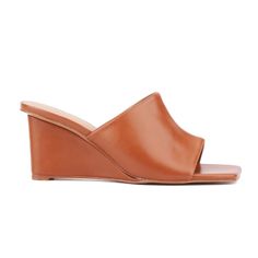 Whether you're heading out for a night on the town or enjoying brunch with friends, the Candie has you covered. This open-toe mule features a chic wedge that combines style with comfort, making it perfect for all-day wear. The versatile design effortlessly complements any outfit, ensuring you look fashionable from day to night. With its blend of elegance and practicality, the Candie is a must-have addition to your wardrobe, offering both sophistication and ease for any occasion. Ankle Strap Chunky Heels, Wide Width Sandals, Kitten Heel Sandals, Faux Leather Heels, Womens Sandals Wedges, Kitten Heel Pumps, Chunky Heels Sandals, Open Toe Shoes, Shoes Heels Pumps