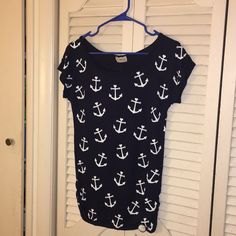 Short Sleeve Scoop Neck Tee Navy Blue With White Anchors Blue Nautical Style T-shirt For Summer, Nautical Beach Tops For Summer, Nautical Tops For Beach In Summer, Nautical Style Beach Tops For Summer, Trendy Navy Summer Tops, White Nautical Tops For Vacation, Navy Crew Neck Top For Summer, Blue Nautical T-shirt For Summer, Nautical Blue T-shirt For Summer