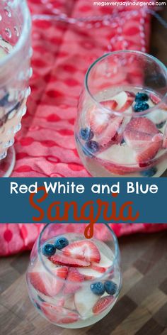 red, white and blue sangjaa in small glasses with strawberries on top