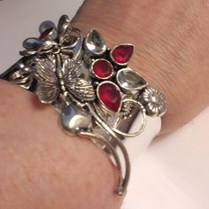 This Stunning Edwardian Victorian Vintage Mid-Century Avant-Garde Bohemian Gothic Celtic Style Bracelet Is A Show Stopper. 925 Sterling Silver 6.5 10 Carats Of Garnet Stones. 6 Carats Of White Topaz Stones Garnet Wearing Jewelry Made From It Will Bring Balance To Your Life, Boost Confidence, Bring Love, Abundance, Wealth, And Success. This Will Be A Nice Addition To Your Jewelry Collection. Red Sterling Silver Bangle Cuff Bracelet, Adjustable Red Sterling Silver Cuff Bracelet, Elegant Red Sterling Silver Cuff Bracelet, Wedding Red Cuff Bracelet, Ceramic Beads Bracelet, Love Abundance, Gold Stretch Bracelet, Pearl Cuff Bracelet, Peridot Bracelet