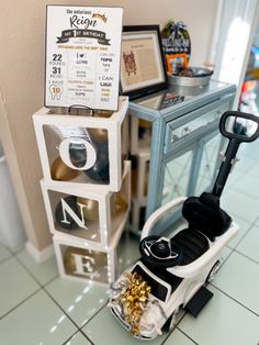 a toy golf cart with gold coins in it next to a sign that says keon