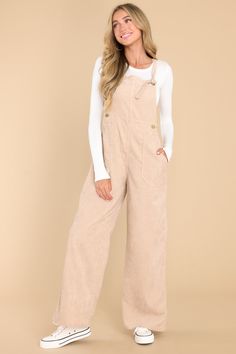 Put on these Stay Kind Beige Corduroy Overalls and show the world that you don't take yourself too seriously! They're the perfect outfit to make a statement about your chill vibes in a playful and stylish way. These overalls feature adjustable self-tie straps. four functional side pockets and two back pockets. buttons below the bust to allow for a folded look. and a corduroy texture throughout. Model is wearing a small. • 100% Polyester • Hand Wash Cold • Unlined • Imported Corduroy Texture, Stay Kind, Sorority Rush Dresses, Overalls Outfit, Corduroy Overalls, Rush Dresses, Cardigan Crop Top, Chill Vibes, Red Dress Boutique