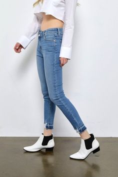 Details Style No. AT1096HRM Elevate your denim game with the High Rise Crossover Skinny Jeans – a seamless blend of comfort, unique detailing, and modern design that enhances your silhouette while adding a touch of contemporary flair to your ensemble. Highlights Super Stretchy Denim Comfort High Quality Material Crossover Waist Detail High Waisted Elegance Released Hem with Distressed Detail Medium Stone Wash Shape & fit • Skinny fit • High rise • Release HemSpecifications: Front Rise: 10 1/2 in Denim Collection, Vintage Jeans, Modern Design, High Rise, High Waisted, Wardrobe, High Quality