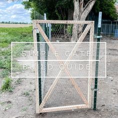 a gate with the words simple gate build guide on it in front of a tree