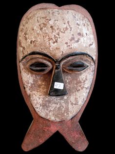 Vuvi mask, 33 cm x 20 cm x 11 cm. Decorative wooden Vuvi mask of elegant design and nice pigment combination. Good condition despite pigment loss due time. Acquired in Africa several years ago. African Mask, African Masks, Art Object, Sculpture Art, Elegant Design, 20 Cm, Etsy Seller, Spain, Mask