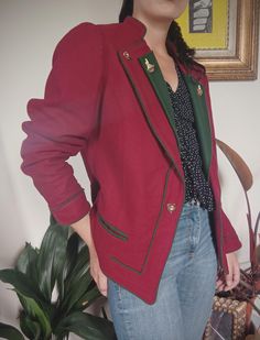 Burgundy (slightly darker than in photos) and dark green 70s vintage women's blazer Short hunting style jacket with big lapels, small, intricate wooden buttons in shapes of deer and hearts Two small pockets Fully lined Wool and polyamide mix Size 38/M Length 63cm Bust 45cm Waist 43 cm Sleeves 59cm Really good vintage condition  🐣 SHIPPING FREE 50% Sale on whole shop! Fitted Burgundy Blazer For Winter, Vintage Winter Workwear Blazer, Vintage Winter Blazer For Workwear, Winter Vintage Blazer For Workwear, Fitted Vintage Burgundy Outerwear, Winter Vintage Blazer For Work, Fitted Burgundy Vintage Outerwear, Vintage Green Fall Blazer, Vintage Green Winter Blazer