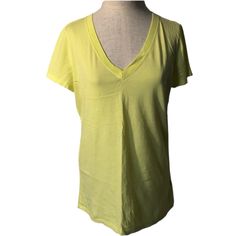 Pastel Neon Yellow V-Neck Short Sleeve Tee. Very Soft. Smoke Free Home. Cross Posted. Approximate Measurements: Chest - 20 Inches Length - 26 Inches Gap Tops For Spring, Gap Basic Summer Tops, Gap V-neck Tops For Spring, Green Gap Tops, Casual V-neck Top By Gap, Gap V-neck Summer Tops, Yellow Cotton V-neck Shirt, Cheap Yellow Short Sleeve T-shirt, Yellow Stretch V-neck Top