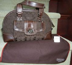 Coach Hampton Signature Brown leather Zip Double Handle Satchel Bag NWT F13977.  Retailed for $358.00.  I purchased it on sale for $269.00.    Bag Dimensions 13x8x5.  strap drop=7 Shipped with USPS Priority Mail. Satchel Bag, Coach Handbags, Satchel Bags, Priority Mail, The Hamptons, Dream Life, Bags Handbags, Brown Leather, Chelsea