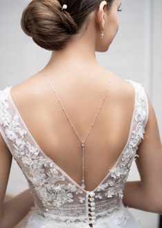 Bridal backdrop necklace made of a very fine sterling silver chain with cubic zirconia stones in settings. This is an over the head necklace without clasp. Can easily be worn as a sautoir after the wedding. To be worn with matching Victoria earrings and Josephine bracelet. - Length: It falls in the back at about 28cm from the base of the neck - 925 Sterling Silver chain Made in France - 7 day return or exchange Made to order: Any length possible, No extra cost. Returns accepted ! Please convo. ♥ Victoria collection https://www.etsy.com/fr/shop/Princessed1jour?ref=l2-shopheader-name&search_query=victoria ♥ Josephine collection https://www.etsy.com/fr/shop/Princessed1jour?ref=l2-shopheader-name&search_query=josephine ♥ All bridal backdrop necklaces https://www.etsy.com/fr/shop/Princessed1jou Delicate Diamond Necklace With Adjustable Chain For Wedding, Wedding Lariat Body Chain With Adjustable Chain, Lariat Body Chain With Adjustable Chain For Wedding, Adjustable Lariat Body Chain For Wedding, Delicate Wedding Body Chain With Adjustable Chain, Delicate Adjustable Wedding Body Chain, Delicate Adjustable Body Chain For Wedding, Elegant Cubic Zirconia Backdrop Necklace With Delicate Chain, Elegant Wedding Body Chain With Adjustable Chain