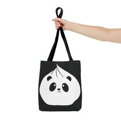 A cute panda dumpling design tote bag perfect for everyday use. Made with 100% polyester fabric, this tote bag is extremely durable and features reinforced stitching on handles and boxed corners for added strength and room. Ideal for panda lovers and those looking for a fun and practical accessory. Perfect for gifting on birthdays, holidays, or as a special treat for yourself.Product features- 100% Polyester body for strength and durability- Seamless thread color for a clean finish- Reinforced stitching on handles for added durability- Boxed corners for extra room- Available in 3 sizes with 5 color handle optionsCare instructions- Remove all items from the bag before cleaning. Suggested to pretreat visible stains with stain remover. Mix warm water with laundry detergent and clean the bag w Dumpling Design, Panda Design, Design Tote Bag, Bag Cute, Soft Bristle Brush, Cute Panda, Laundry Detergent, Gift Wrapping Paper, Holiday Design