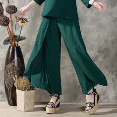 Fit Type: LoosePant Style: Wide Leg PantsFront Style: FlatWaist Type: MidFabric Type: BroadclothMaterial: Cotton, LinenLength: Ankle-Length PantsClosure Type: Elastic Waist SKU: 1475000 Green Ankle-length Wide Leg Pants For Spring, Baggy Wide Leg Pants For Spring, Casual Spring Dress Pants, Casual Full-length Dress Pants For Spring, Casual Full Length Dress Pants For Spring, Green Casual Dress Pants For Summer, Spring Relaxed Fit Full-length Harem Pants, Relaxed Fit Full-length Harem Pants For Spring, Non-stretch Spring Dress Pants