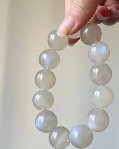 Material:moonstone beads size :Approx 17mm   quantity: one strand  6mm approx 29 pcs one strands 7mm approx25 pcs one strands 8mm approx 22 pcs one strands 9mm approx 21pcs one strands 10mm approx 19 pcs one strands 11mm approx 18pcs one strands 12mm approx 16 pcs one strands 13mm approx 16 pcs one strands 14mm approx 15 pcs one strands 15mm approx 14pcs one strands 16mm approx 14 pcs one strands 17mm approx 13pcs one strands 18mm approx 13pcs one strands 19mm approx 12pcs one strands 20mm appro Round Moonstone Beaded Bracelets As Gift, Moonstone Beaded Bracelets For Healing, Moonstone Beaded Bracelets With Gemstones, Moonstone Crystal Bracelet With Gemstone Beads, Handmade Moonstone Crystal Bracelet, Moonstone Gemstone Beaded Bracelets, Handmade Moonstone Crystal Bracelet With Round Beads, Moonstone Crystal Bracelet With Round Beads As Gift, Moonstone Gemstone Beads Crystal Bracelet