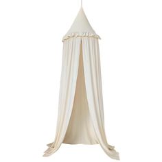 a white canopy bed hanging from the ceiling