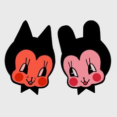 two black and pink cats with red noses