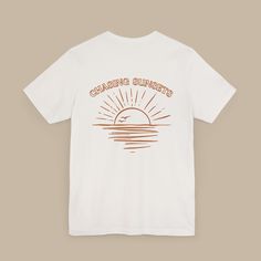 Product Description: "Chasing Sunset" T-Shirt - Capture the Magic of the Dusk Immerse yourself in the beauty of every sunset with our "Chasing Sunset" T-shirt. Designed for nature lovers and dreamers, this shirt captures the essence of those golden moments when the sun meets the horizon. Product Features: Material: 100% soft and comfortable cotton. Design: Printed with high-quality inks ensuring vibrant colors and durability. Style: Unisex fit, perfect for any casual occasion. Available Sizes: S Sunset Shirt, Golden Moments, Chasing Sunsets, Beach T Shirt, Beach T Shirts, Beach Shirt, Travel Shirts, Beach Shirts, Summer Tshirts