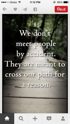 a wooden walkway leading into the woods with a quote on it that reads, we don't meet people by accident they are meant to cross our path for a reason