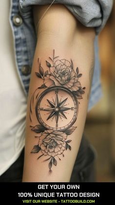 a woman with a compass and roses tattoo on her arm