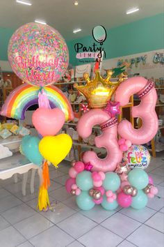 some balloons that are in the shape of letters and numbers for birthdays or any other celebration