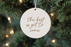 the best is yet to come ornament hanging on a christmas tree