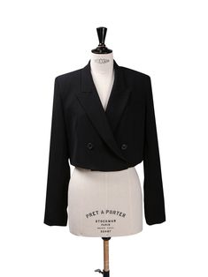 Tuxedo style chic blazer in cropped length. Overlap at front with button details and low plunging neckline with collar. Button detailing at cuffs. Great to dress up or down. Model is in MINUSEY ONE SIZE. ✔️ Free worldwide express shipping over $100✔️ Loved by 6,500+ customers✔️ Limited edition collections, maximum style⠀⠀⠀⠀⠀⠀⠀⠀⠀Stay ahead of the trend with can’t-find-anywhere-else staples. Your closet will thank you 💕* MINUSEY ONE SIZE = EU 34-36, US 2-6* 100% Polyester* Dry clean* Made in Korea - Model Height: 172cm/5'7" (US 2, EU 34) Cropped Jacket With Double Button Closure For Work, Workwear Cropped Jacket With Double Button, Cropped Workwear Jacket With Double Button Closure, Spring Cropped Jacket With Double Button Closure, Cropped Office Jacket With Double Button Closure, Office Cropped Jacket With Double Button Closure, Tailored Cropped Jacket With Buttons, Formal Cropped Buttoned Jacket, Formal Cropped Jacket With Buttons