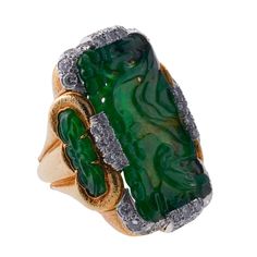 Exquisite 18k gold and platinum ring by David Webb, with carved jade and approx. 2.50ctw H/VS-Si diamonds. DESIGNER: David Webb MATERIAL: 18k Gold / Platinum GEMSTONES: Diamond, Jade DIMENSIONS: Ring size 6-7 (with ring guard), top is 38mm x 27mm. MARKED/TESTED: Webb, 18k, 10% irid.plat. WEIGHT: 37.2 grams CONDITION: Previously Owned, Excellent Condition. Luxury Green Intaglio Rings, Ring Guard, David Webb, Carved Jade, Jade Carving, Platinum Ring, Stunning Jewellery, Gold Platinum, Gold Ring