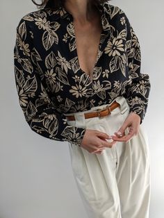 Floral patterned linen and cotton blend button up blouse. It has a collar, onyx button closures and a long cuffed sleeve. Tag reads Harve Benard Floral Dress Shirt, Patterned Button Up Shirts, Vintage Floral Blouse, Knit Outerwear, Cuffed Sleeve, Floral Shirt Dress, Line Shopping, Linen Blouse, Button Up Blouse