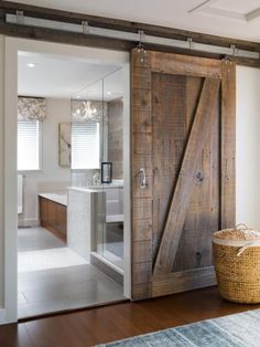 an open barn door in the middle of a living room