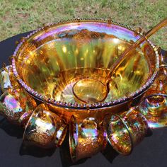 a glass bowl sitting on top of a table