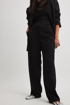 These suit pants feature a tailored fit, a mid waist with belt loops and a straight leg. They have side slant pockets and a zipper, hook and button closure. Black Wide Leg Pants With Straight Hem For Office, Office Pantsuit With Belt Loops, Black Cargo Pants With Belt Loops For Work, Black Wide Leg Pants For Business With Straight Hem, Elegant Cargo Pants For Workwear With Belt Loops, Elegant Cargo Pants For Workwear, Modern Black Wide Leg Pants With Belt Loops, Tailored Black Wide Leg Pants With Straight Hem, Black Tailored Wide Leg Pants With Straight Hem