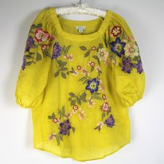 Sundance Catalog Blooming Arbor Lemon Yellow Floral Embroidery Top New With The Tag Size: S Material: 100% Ramie Embroidery: 100% Polyester Care: Hand Wash Inside Out Pullover Scoop Neckline With Elastic Stretch Shoulders Elbow Sleeves With Elastic Cuffs Scoop Hemline New With The Tag, Never Worn! Approx. Measurements: Across The Underarms: 19.5" Sleeve Length From Shoulder Seam: 16.5" Length Down The Center Back: 22.5" Embroidered Yellow Summer Blouse, Yellow Embroidered Summer Blouse, Embroidered Yellow Blouse For Summer, Yellow Embroidered Beach Top, Yellow Embroidered Top For Beach, Yellow Embroidered Blouse For Beach, Yellow Embroidered Spring Blouse, Spring Yellow Blouse With Floral Embroidery, Yellow Floral Embroidered Blouse For Spring