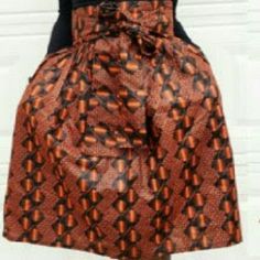 African Women Ankara Dark Orange And Black Print Knee Length Skirt. Multi Color Vibrant Print. Pleated Handmade Skirt With Side Pocket. Made With 100% Cotton Fabric. Length Is 24 Inches Sizes Size 4; Waist 28" Size 6; Waist 30" Size 8; Waist 32" Size 10"; Waist 34" Size 12; Waist 36" Size 14; Waist 38" Size 16; Waist 40" Size 18, Waist 42" Fitted Orange Pleated Skirt, Orange Skirt Bottoms With Pockets, Orange Relaxed Mini Skirt, Orange Relaxed Fit Mini Skirt, Relaxed Fit Orange Mini Skirt, Orange Mini Skirt Bottoms With Pockets, Orange Relaxed Mini Skirt With Lining, Orange Relaxed Fit Lined Mini Skirt, Orange Mini Skirt With Pockets