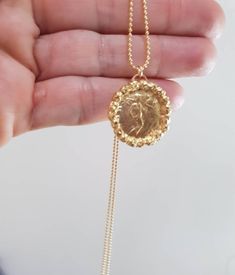 Gold coin necklace, gold pendant necklace, 14k gold necklace, antique coin necklace, medallion necklace, long coin necklace Long 14k gold filled necklace with an antique gold coin pendant, decorated with golden hammered beads. Beautiful minimalist round pendant, designed in an antique style, this gold coin medallion necklace is just a great gift for her It will be your to go necklace, for day or night, never needing to to take it off. Dimensions: The coin medallion pendant diameter is about 0.75 Gold Medallion Coin Necklace In Brass, Gold Brass Medallion Coin Necklace, Brass Coin Medallion Necklace, Brass Medallion Coin Necklace, Brass Coin Pendant Necklace In Medallion Shape, Brass Medallion Necklace With Coin Pendant, Antique Brass Coin Necklace With Round Pendant, Gold Coin Pendant Medallion Necklace In Brass, Gold-plated Medallion Coin Pendant Necklace