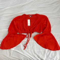 Urban Outfitters Self-Tie Crop Top Size Medium Condition: Nwt Color: Red Details : - Bell Sleeves - Front Tie In Front - Perfect On Your Own Or With A Tank Or Bralette Under Extras: - I Ship Between 1-2 Days Summer V-neck Tied Tops, Trendy Spring Top With Tied Details, Trendy Tied Tops For Spring, Trendy Summer Tops With Tie Waist, Trendy Tie Waist Top For Summer, Fitted Tie Detail Vacation Tops, Fitted Tie-detail Top For Vacation, Casual Tied Top For Brunch, Spring Party Tops With Tied Details